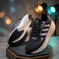 Performance Running Shoes in Black / White, men's casual shoes — side profile view