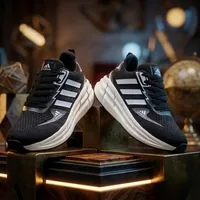 Performance Running Shoes in Black / White, men's casual shoes — angled front view
