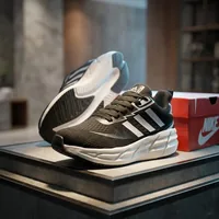 Performance Running Shoes in Black / White, men's casual shoes — inner side view